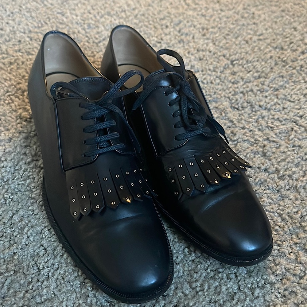 Salvatore Ferragamo lace up Oxford shoes size 8.5 Black with gold details.